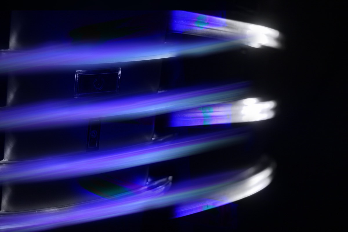 Server racks with glowing indicator lights inside a video-hosting data center