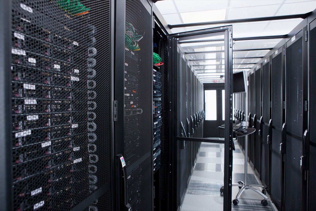 Enterprise server racks in a data center, representing third-party support for licensed enterprise software