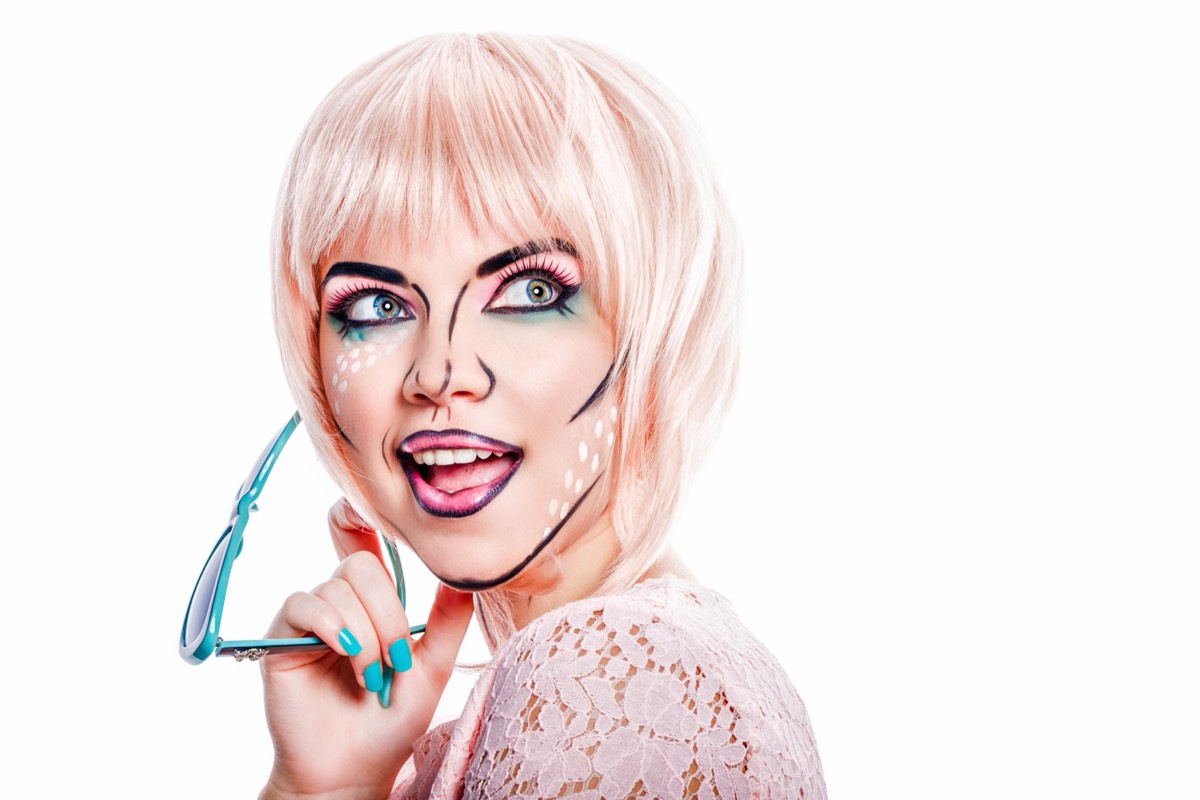 A brightly colored silkscreen-style portrait illustrating pop-art appropriation of a photographic image