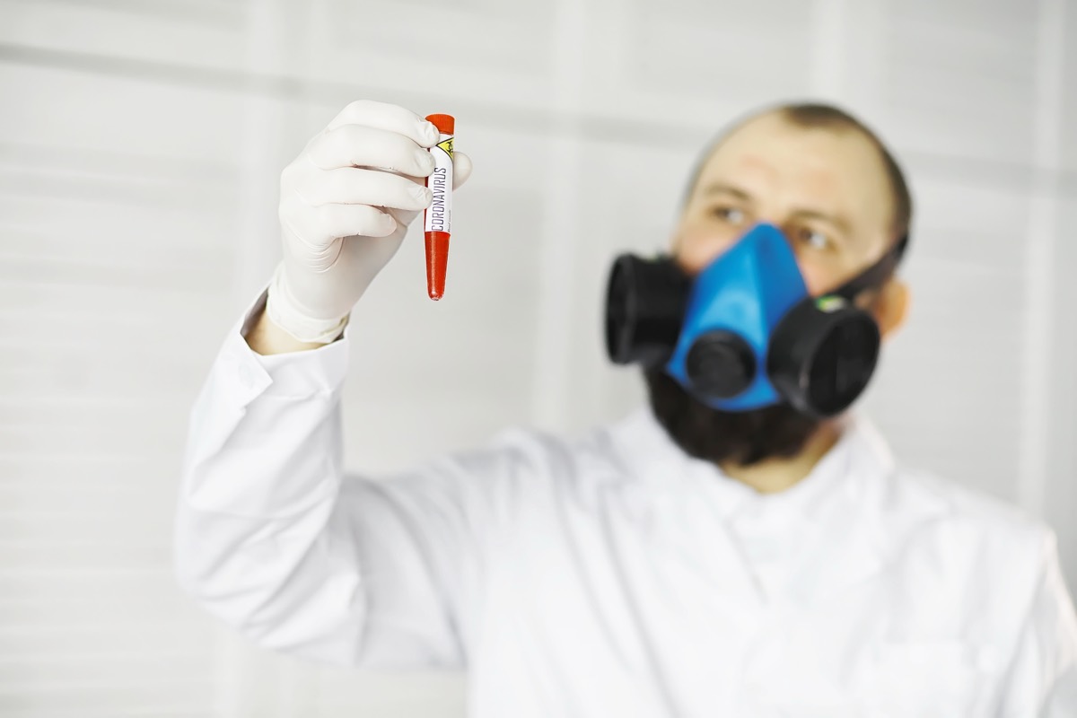 Scientists working with samples in a cancer research laboratory