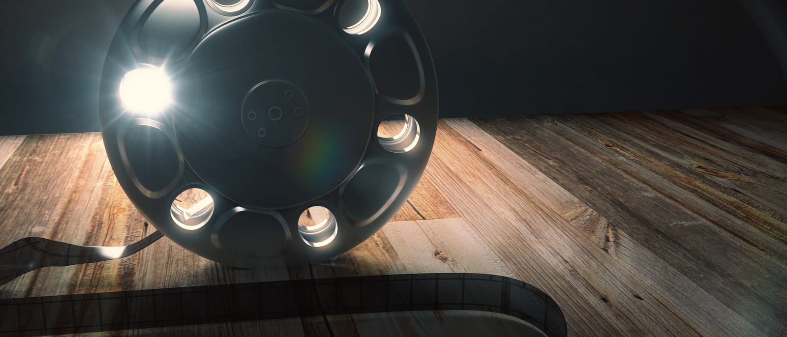A photographer's light table covered with film slides and a loupe