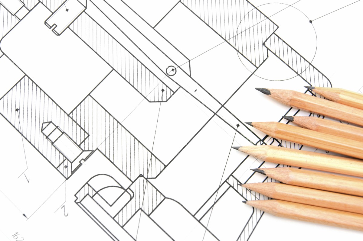 A split image contrasting a code file and a patent diagram