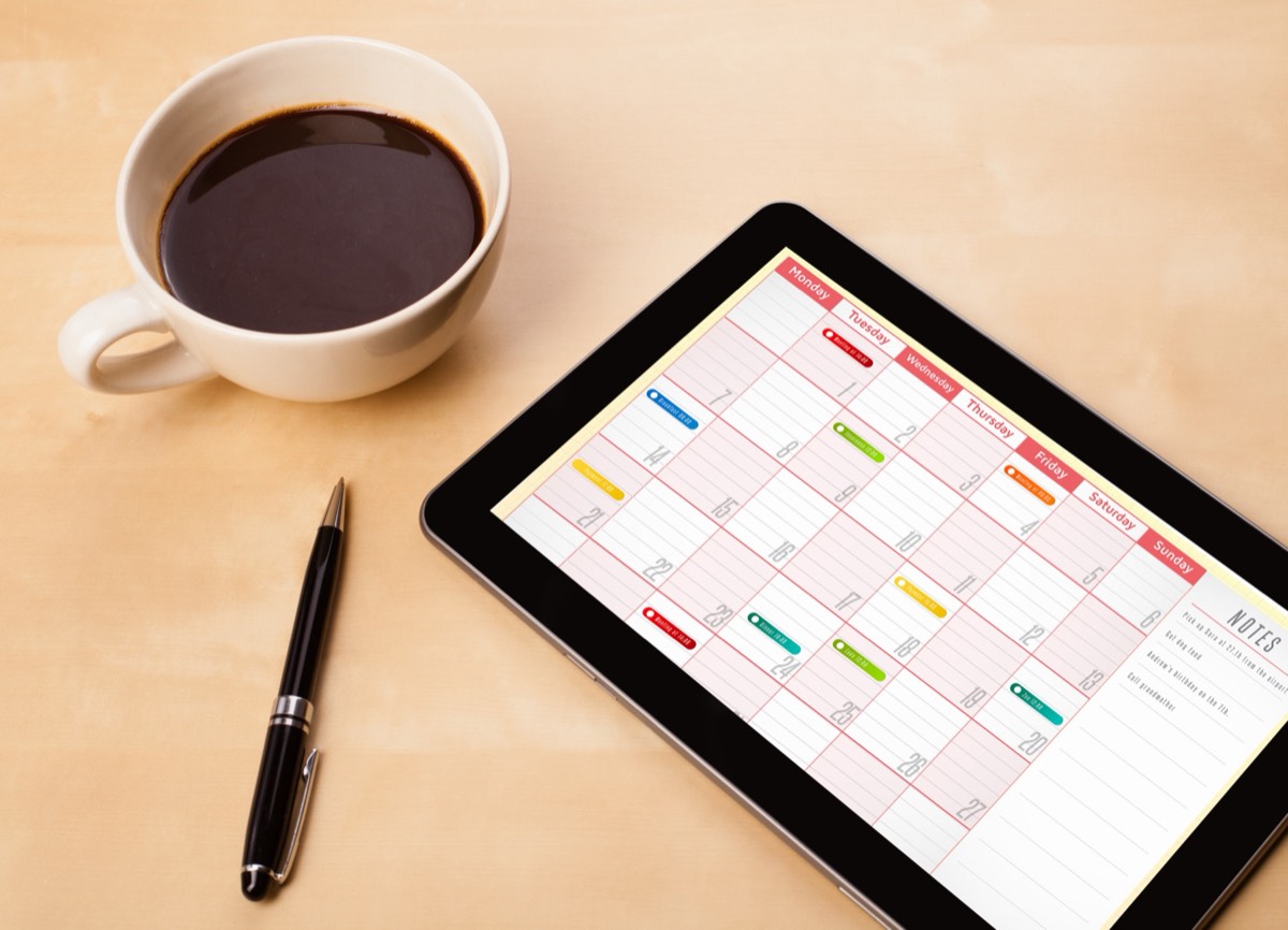 Calendar and planner on a desk marking trademark application milestones