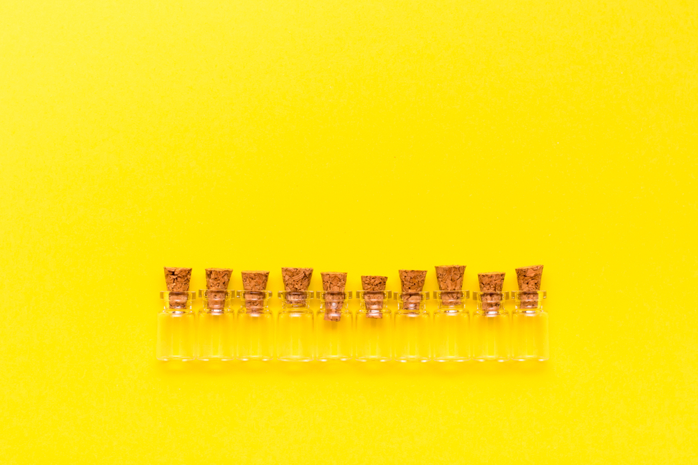 A row of printer toner cartridges lined up on a shelf