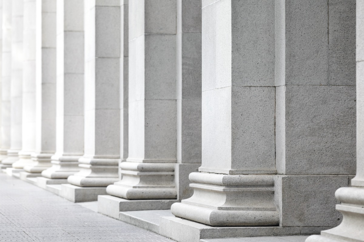 Exterior of a federal district courthouse with stone columns