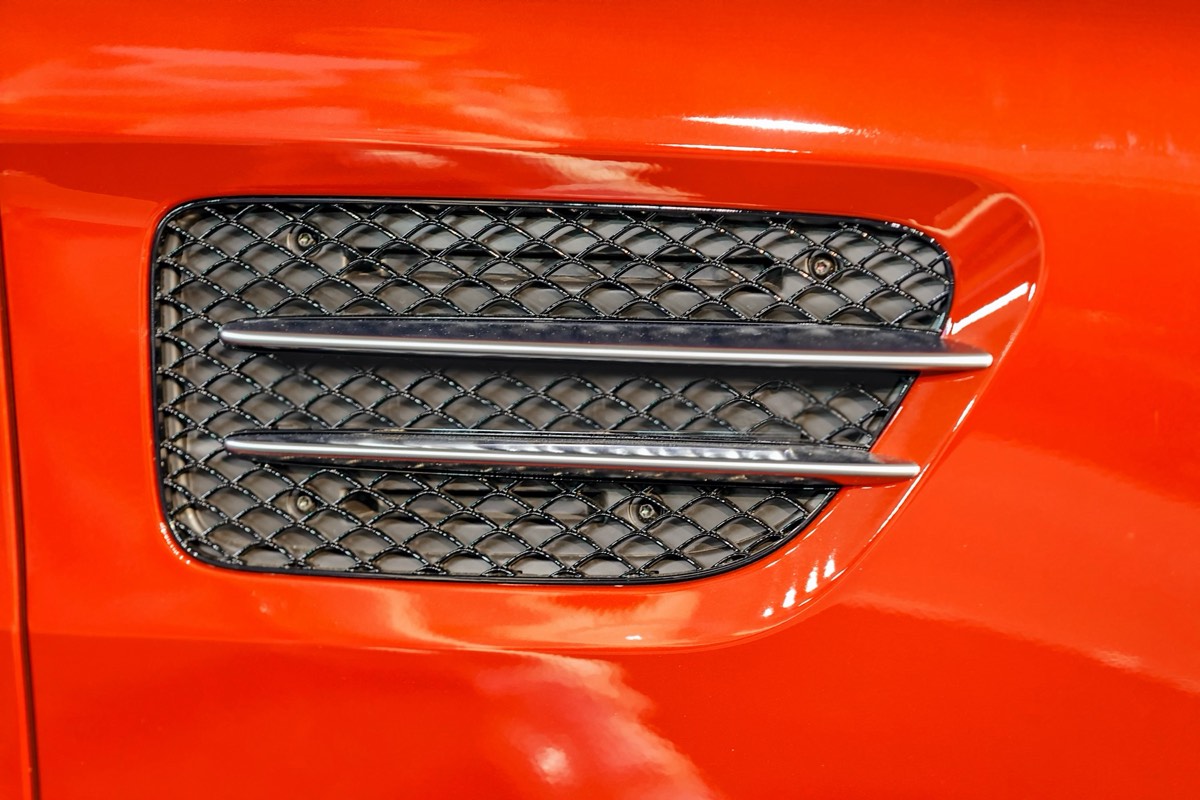 Close detail of an automobile body panel