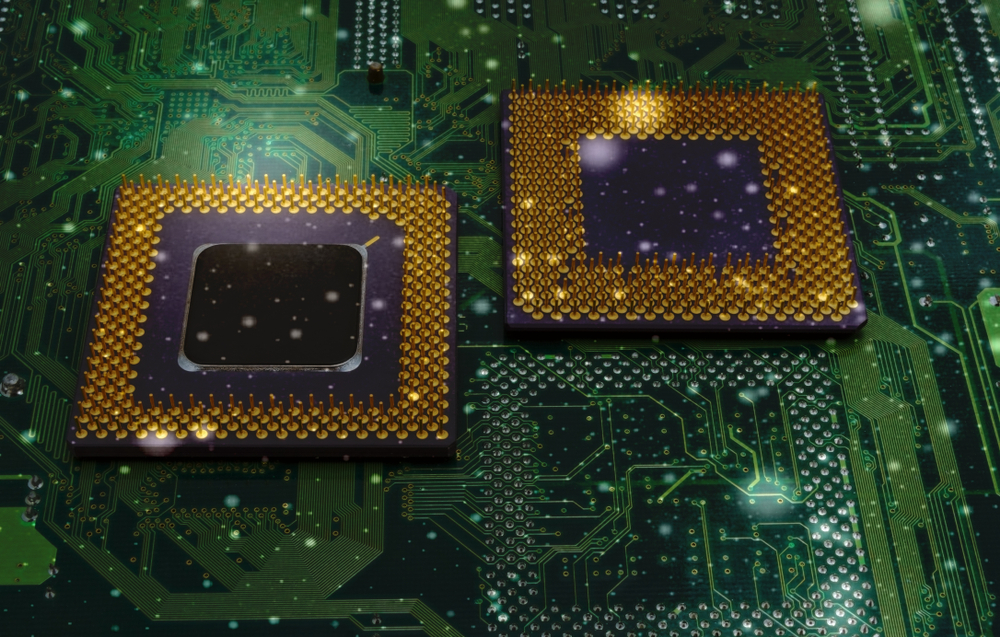 Video game console circuit board with chips under bright light