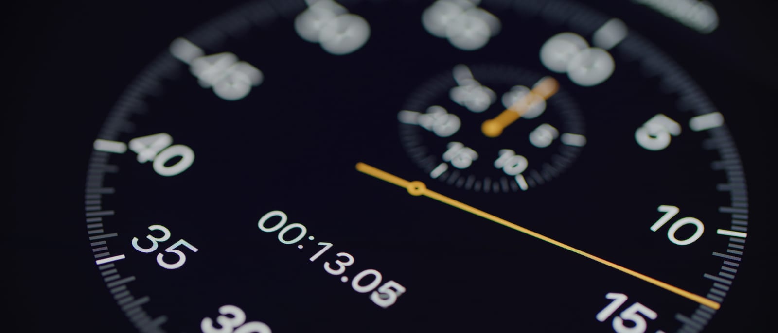 A close-up of a vintage stopwatch resting on a stack of legal documents