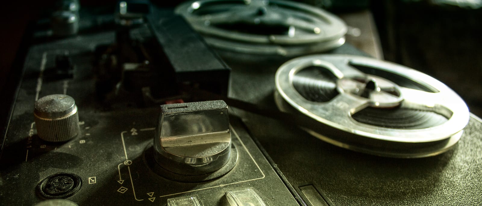 Vintage mainframe computer with reel-to-reel tape drives in a data center