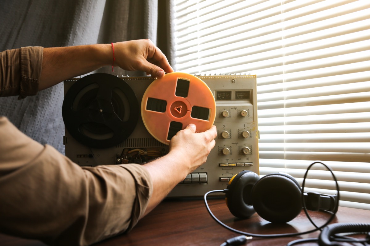A reel-to-reel precision magnetic tape recorder with spinning reels